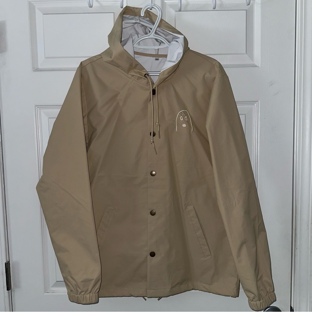 Brand new Unxpectd Windbreaker Rain Jacket